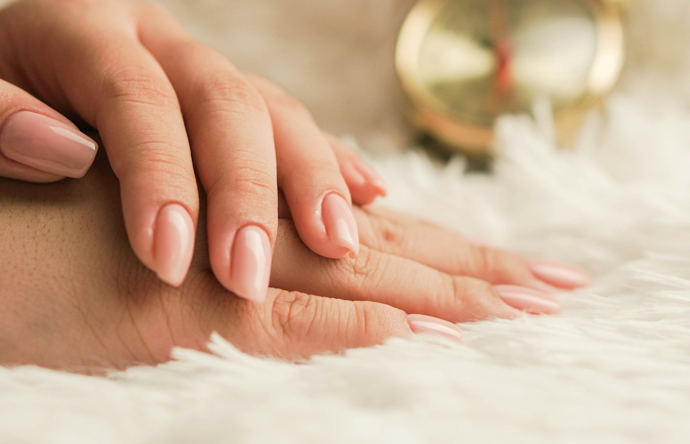 A fresh soft-pink gel manicure